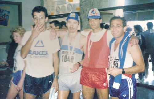 John Walsh (second from left) after finish of the first Malta Marathon in 1986. John is seen with Joe Farrugia to his right, Peter Borg Costanzi to his left and Charles Micallef St. John to his far left.